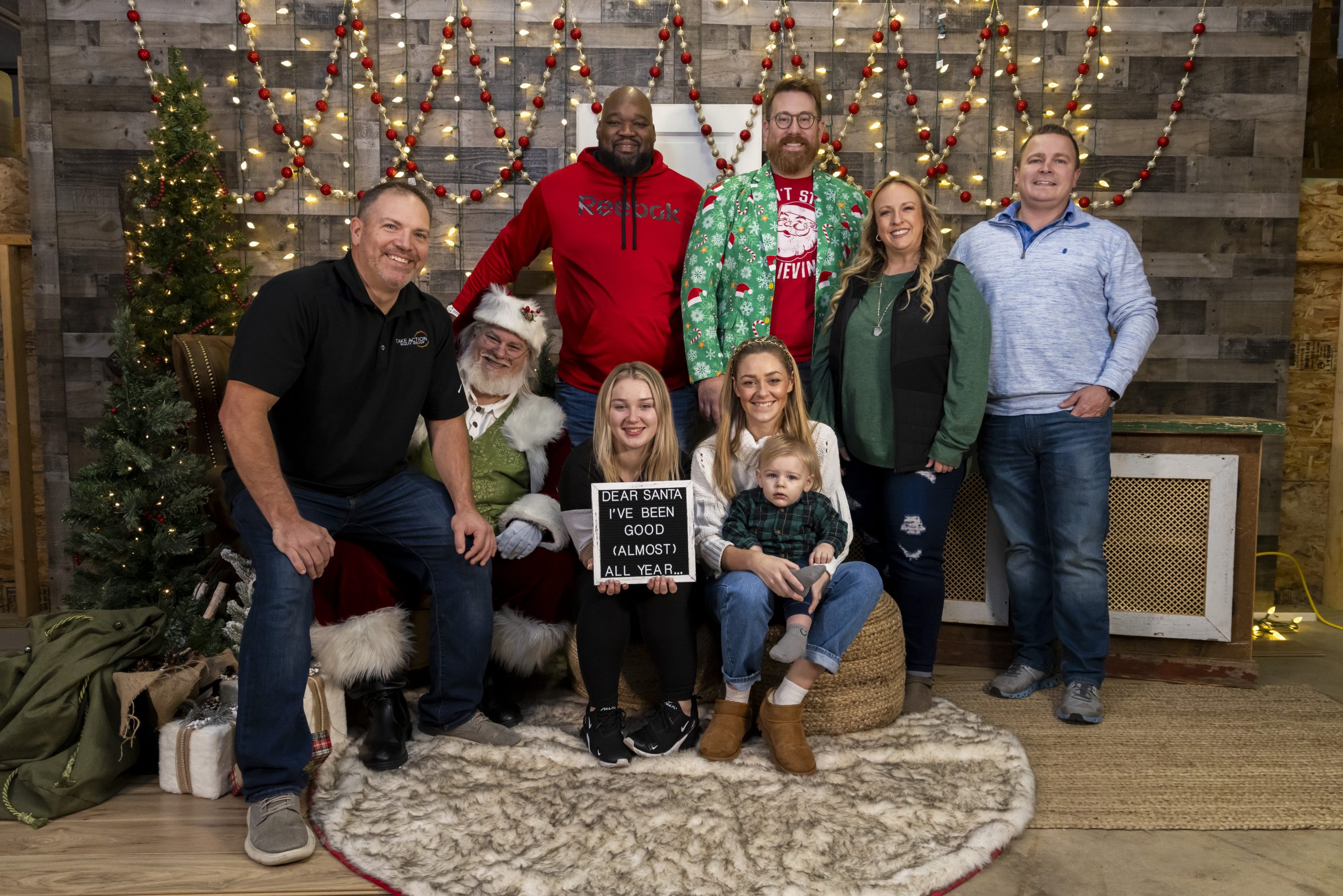 Take Action Realty’s Festive Photo Session with Santa